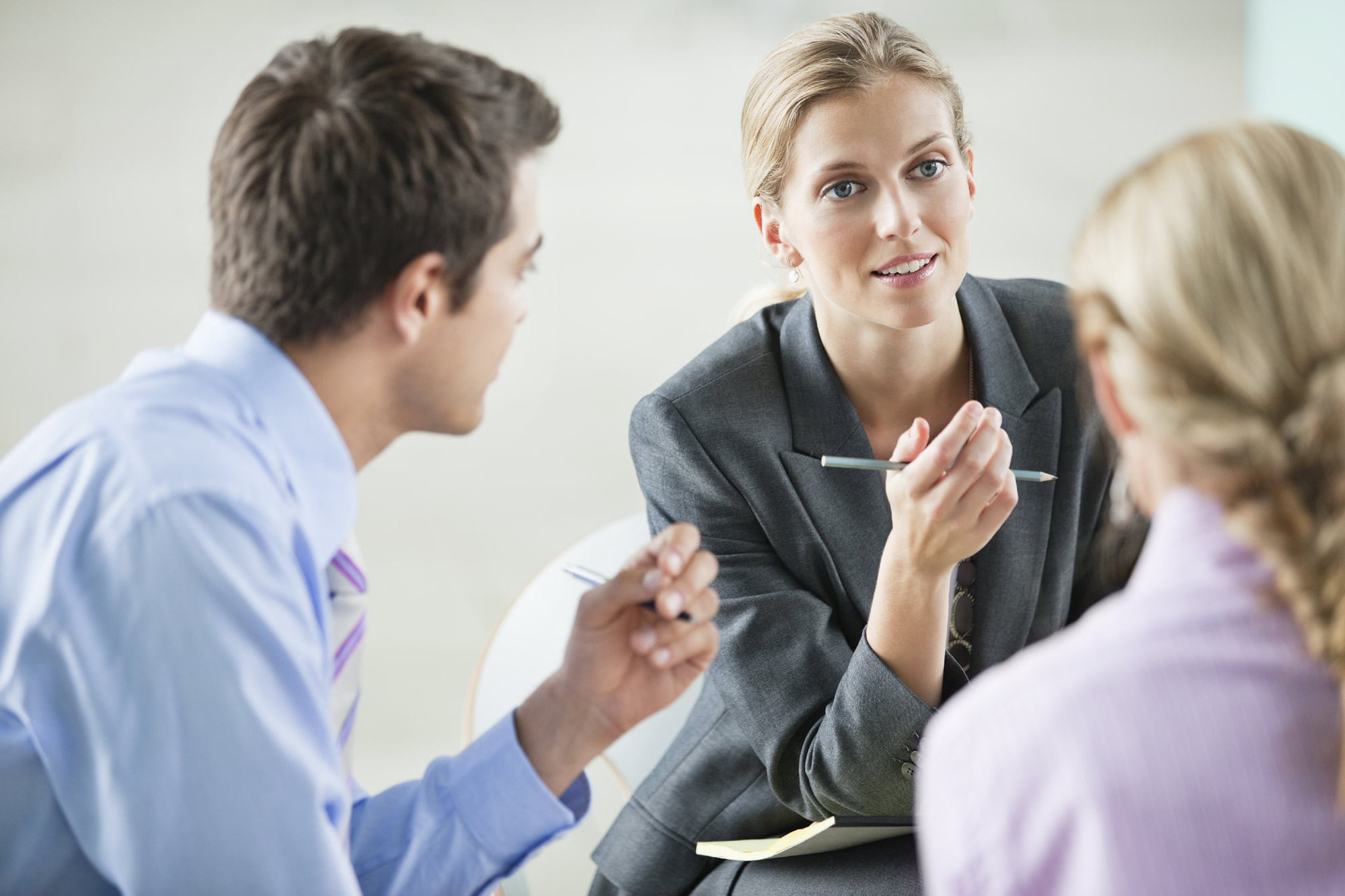 Business advisor team in a meeting discussing a business strategy plan.